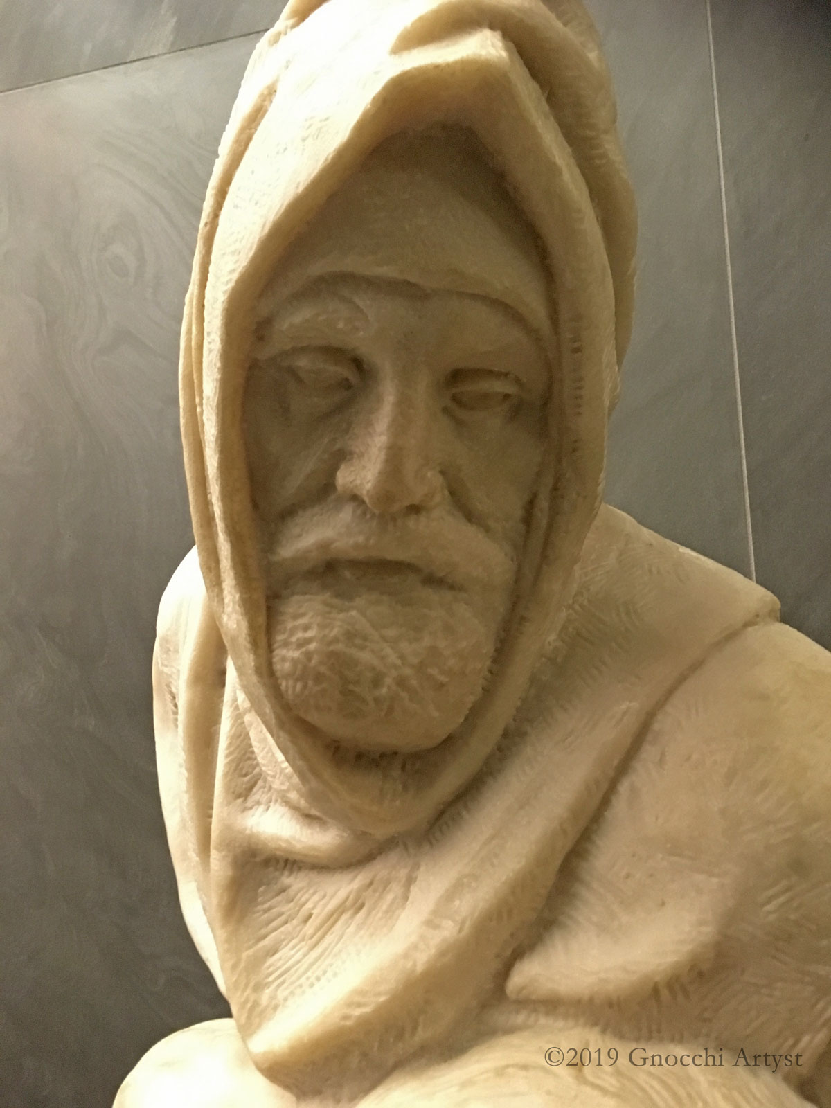 Statue of old man (Michelangelo)